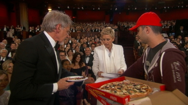 VIDEO: Ellen DeGeneres serves pizza during Oscars.