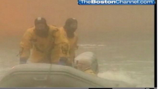 VIDEO: Firemen in Scituate, Mass. rescue family whose flooded home burst into flames.
