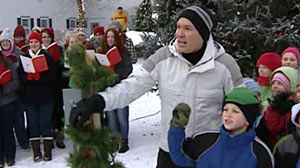 PHOTO Sam Champion chats with kids in Essex, Vermont, Dec. 10, 2010.