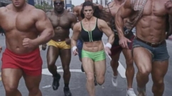 Website domain providers commercial has bodybuilders running to a spray-tan business. 