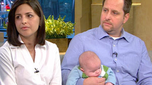 Karin McHugh almost died from the H1N1 virus while pregnant. She?s seen here in the hospital with her husband Brian and son Liam.