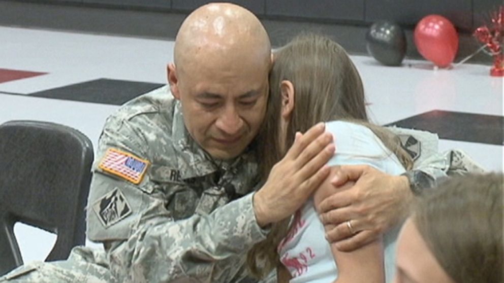 Maj. Julian Reyes delivered his fifth-grade daughter her diploma after not seeing her in nearly a year.