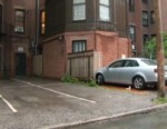 VIDEO: A woman spends over half a million dollars for two off-street spaces in the city.