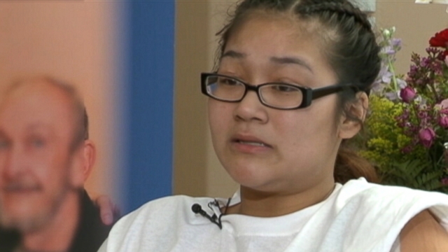 VIDEO: Mindy Tran crushed her knee while trying to stop a rolling car that had her twin daughters inside.