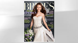 PHOTO A wedding dress designed by Vanessa Tapia is shown on the Dec. cover of Brides Magazine.