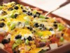 PHOTO This recipe for corn tortilla chicken lasagna serves 24, satisfying a hungry crowd.