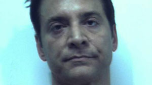 James Arthur Ray seen in his booking photo from Feb. 3, 2010, when he was arrested and charged with three counts of manslaughter connected to the deaths at an Arizona sweat lodge in October 2009.