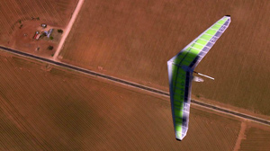 PHOTO A hang glider pilot tries to find the best lift over the flatlands of Texas at the U.S. Hang Gliding National Championships in Big Spring, Texas in August 2009