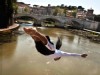 PHOTO Cliff Diver Orlando Duque dives from a bridge in Rome, Italy.