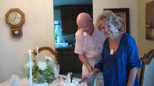 The couple cuts the cake: Fontelle and Robert Harrod on their wedding day, July 1, 2009