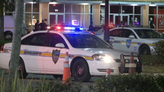 Police say 600-person melee in parking lot started after a group tried to storm the theater without tickets.