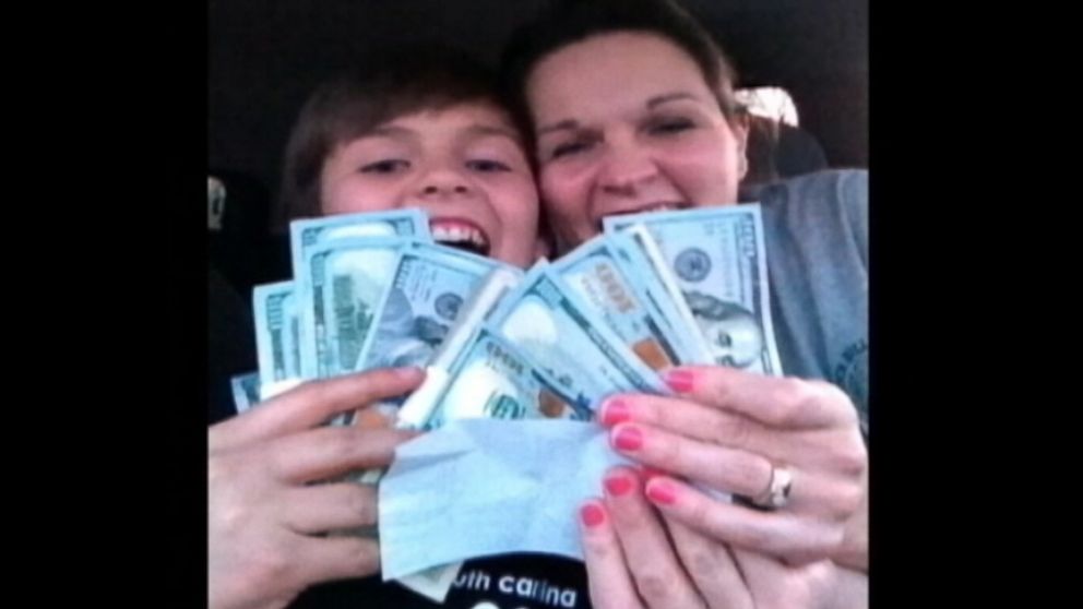 A South Carolina teacher turned in $11,000 that flew out of a truck in front of her.