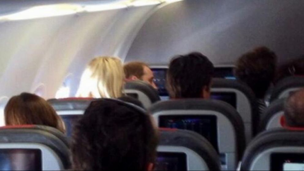 VIDEO: Prince William flew in economy class aboard an American Airlines plane.