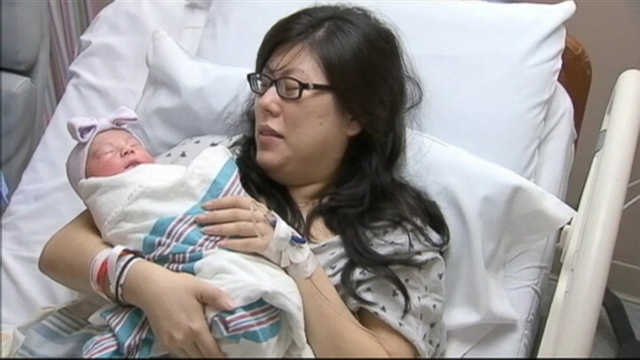 VIDEO: Shirley Bonannis husband was pulling her to their car on a sled, but baby Bella wouldnt wait.