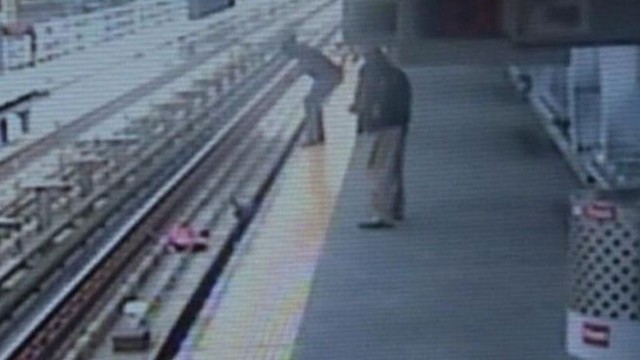 VIDEO: The toddlers mother jumped onto the tracks to save her child.
