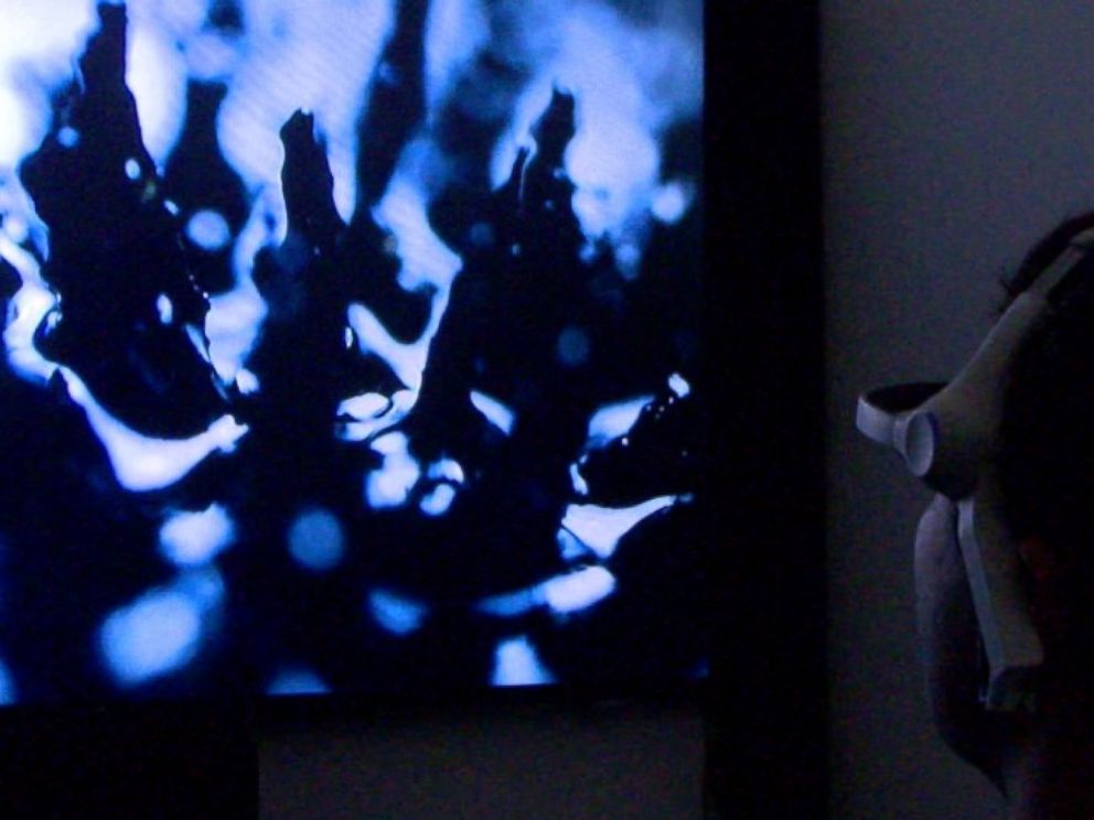 PHOTO: Ion Popian measures participants’ brainwaves, while they watch a film. Their brainwaves are then turned into 3-D models.