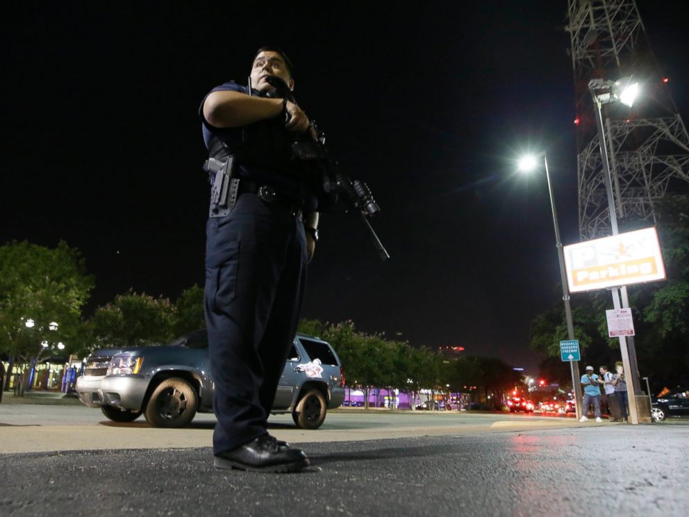 PHOTO: Dallas police stand watch after police officers were shot in downtown Dallas, July 7, 2016.