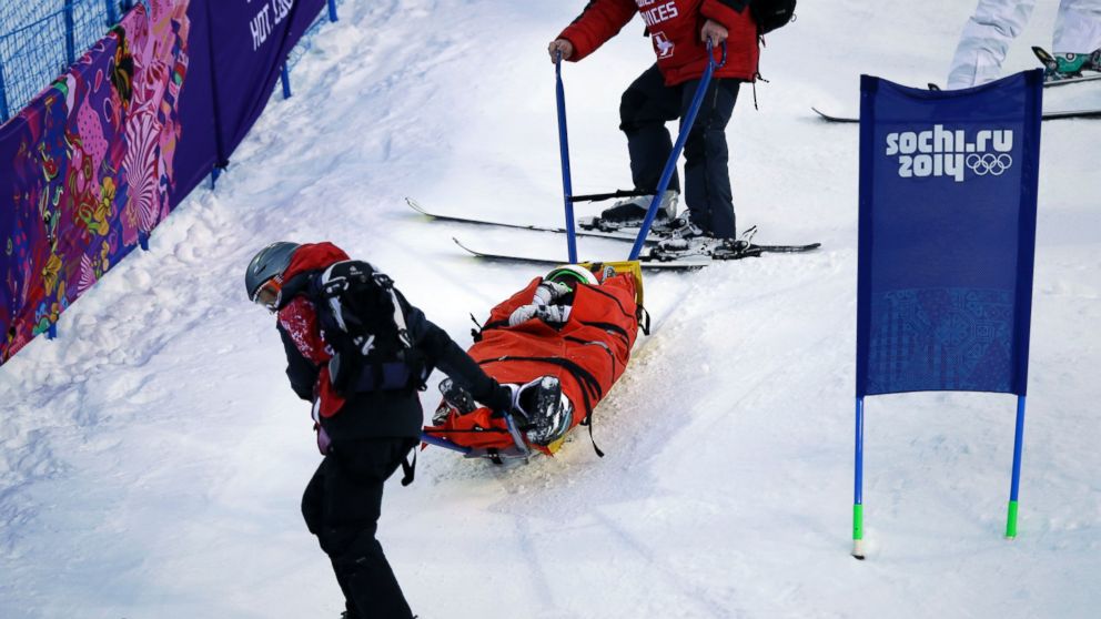 PHOTO: United States Heidi Kloser is stretchered off the course after crashing in a warm up run in the womens moguls at the Rosa Kutor Exreme Park during the 2014 Sochi Winter Olympics, Feb. 6, 2014, in Krasnaya Polyana, Russia.