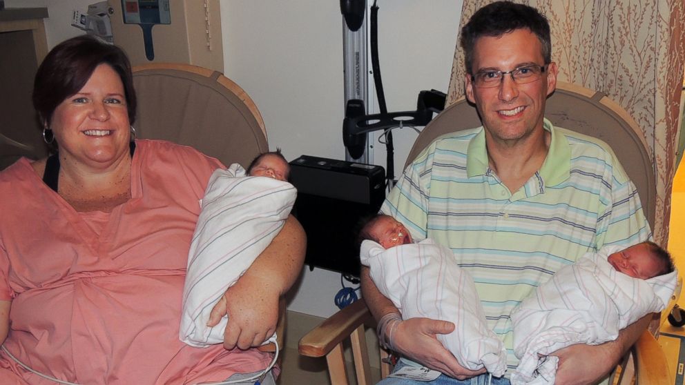 PHOTO: April and Brad Dooley hold their newly born identical triplets, from left to right, Patrick, Owen and Liam at the Long Beach Memorial, Miller Children?s Hospital in Long Beach, Calif., Jan. 17, 2014.