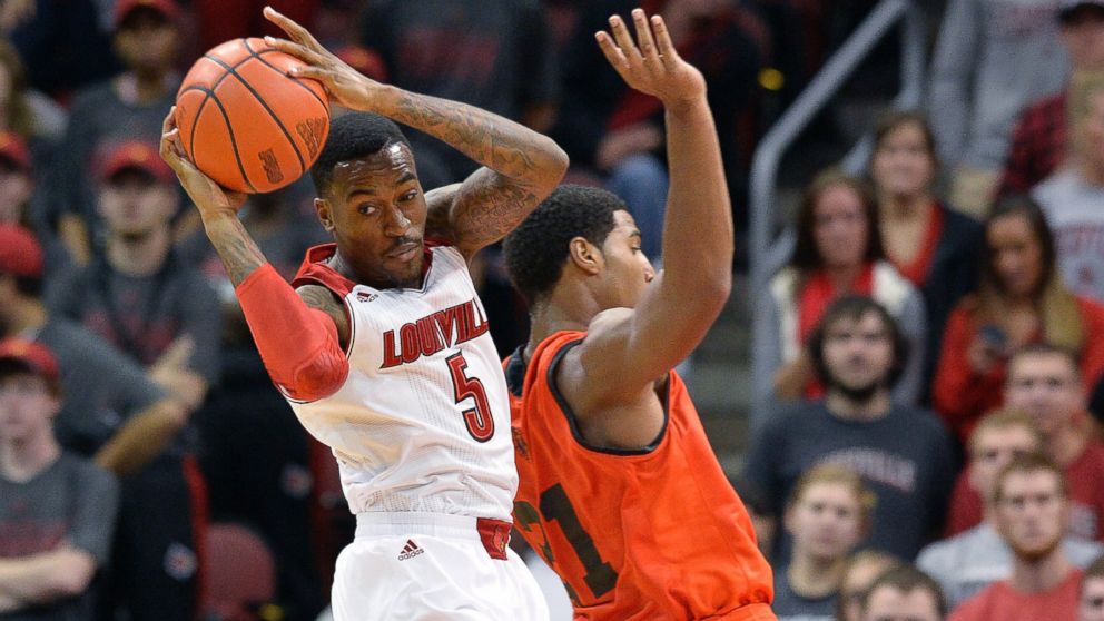 PHOTO: Louisvilles Kevin Ware, left, rebounds during the second half of an NCAA college basketball exhibition game, Nov. 6, 2013, in Louisville, Ky. 