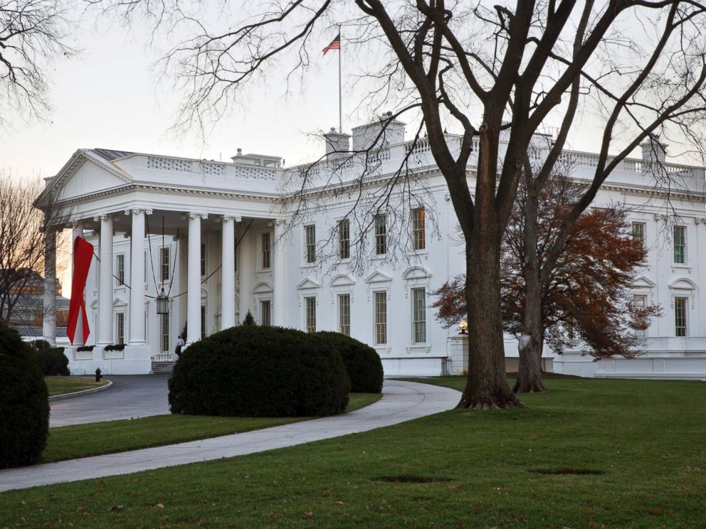 PHOTO: The White House in Washington is decorated with a red ribbon in honor of World AIDS Day, Dec. 1, 2014.