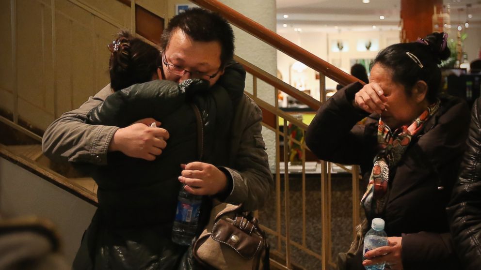 PHOTO: Relatives of a passenger onboard Malaysia Airlines flight MH370 at the Lido Hotel where families are gathered on March 9, 2014 in Beijing, China.