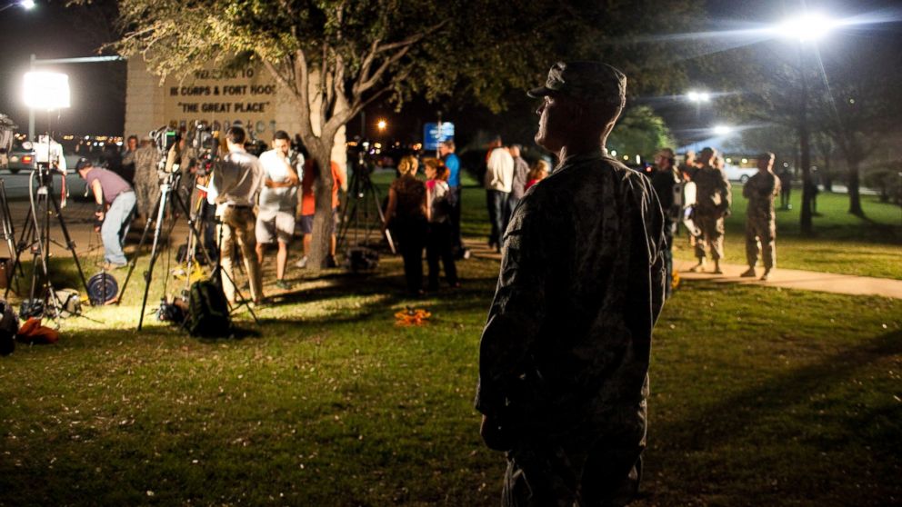 PHOTO: A soldier watches a press conference