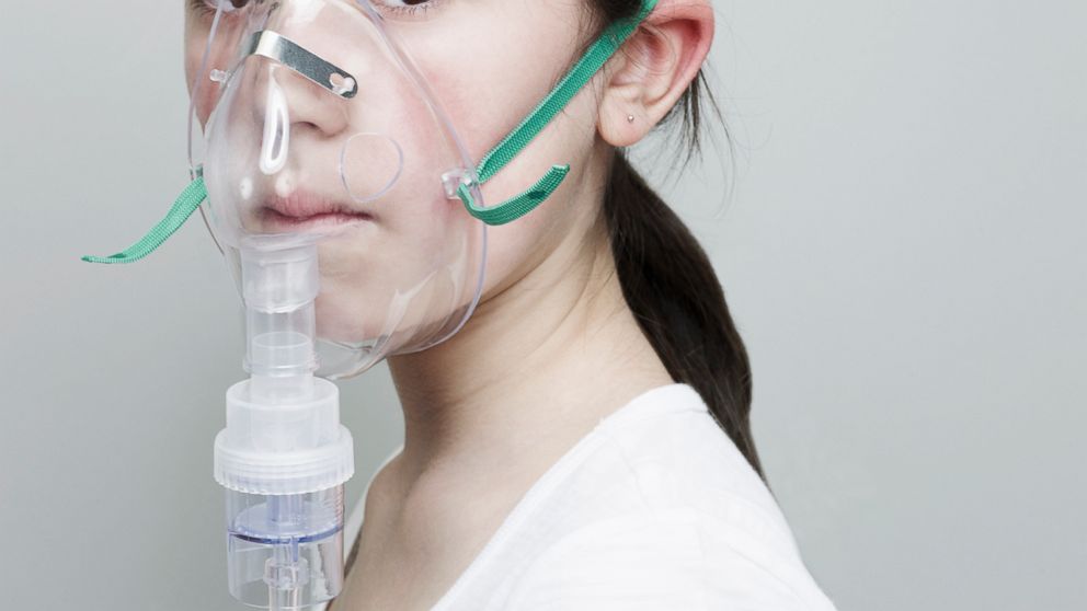 PHOTO: A young girl uses an oxygen mask in this undated file photo.