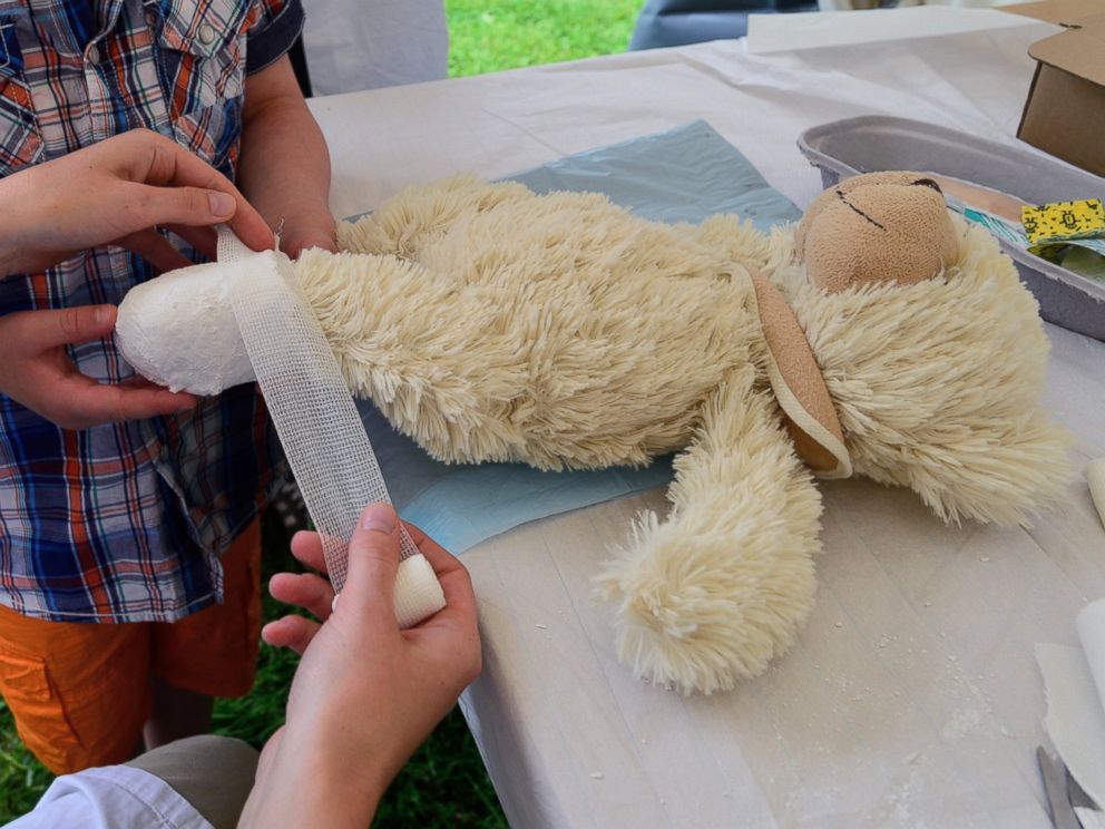 PHOTO: A teddy bear that belongs to a young boy gets a bandage at the Teddy Clinic on June 4, 2014 in Giessen, Germany.