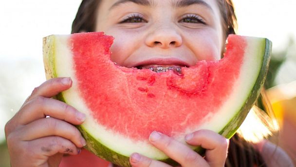 Popping some watermelon into your mouth is a great way to rehydrate after a long day in the sun.