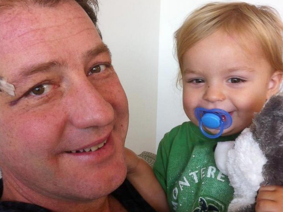 PHOTO: Eric Jordan holds his son, Gabriel, who he says woke him up during his stroke.