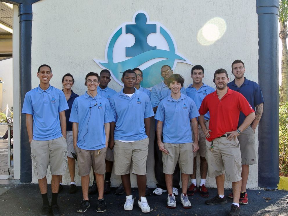 PHOTO: Employees of Rising Tide Car Wash pose for a photo.