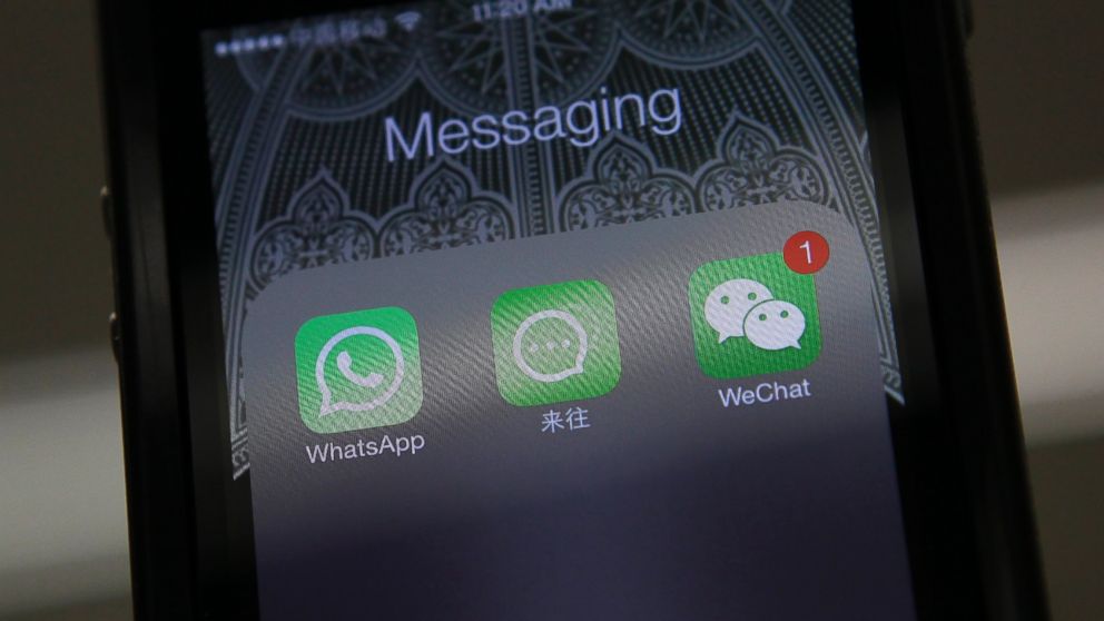 PHOTO: Icons of messaging applications WhatsApp of Facebook, Laiwang of Alibaba Group and WeChat, or Weixin, of Tencent Group, are seen on the screen of a smart phone on this photo illustration taken in Beijing, Feb. 24, 2014.