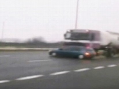 VIDEO: Car driver escapes injury, new investigation opened after police see video.
