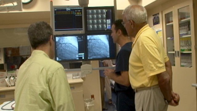 PHOTO: Dr. Hakim Morsli shows my Dad's scan, Sarasota Memorial Hospital.