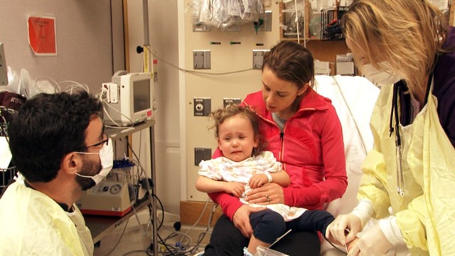 PHOTO: Little Cassie is treated at Boston's Children's Hospital when her mother brings her in with suspected flu symptoms. She was one of dozens of patients Boston-area hospital treated for flu in the past 48 hours.