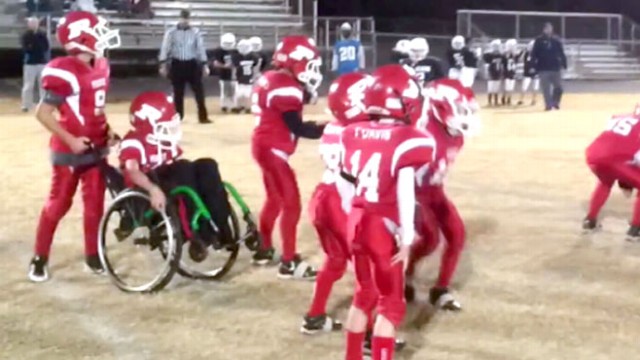 VIDEO: Wheelchair-Bound Boy Fulfills Football Dream