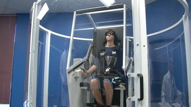PHOTO: Will Arlen, 17, is strapped into the GyroStim, a machine that Dr. Ted Carrick said helps stimulate parts of the brain that may be damaged.