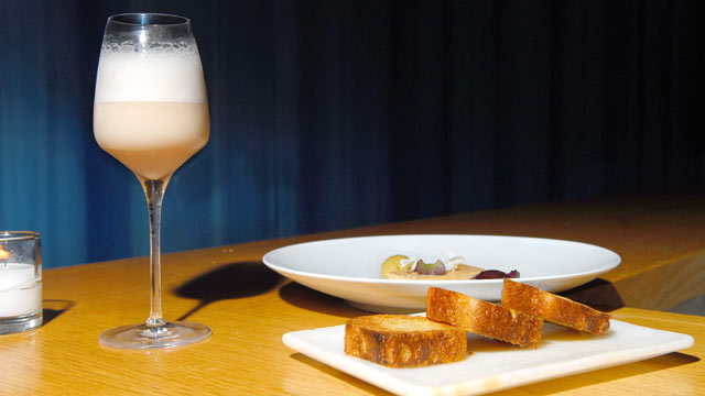PHOTO: Aldea's Raymos Gin Fizz cocktail is seen here along with their signature Foie gras.