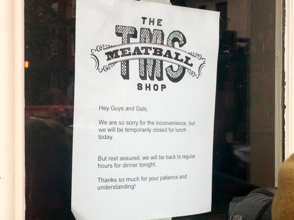 PHOTO: A sign on the front door of The Meatball Shop on Greenwich Avenue in the Manhattan borough of New York City says that the shop is closed for lunch but will reopen for dinner on Oct. 24, 2014.