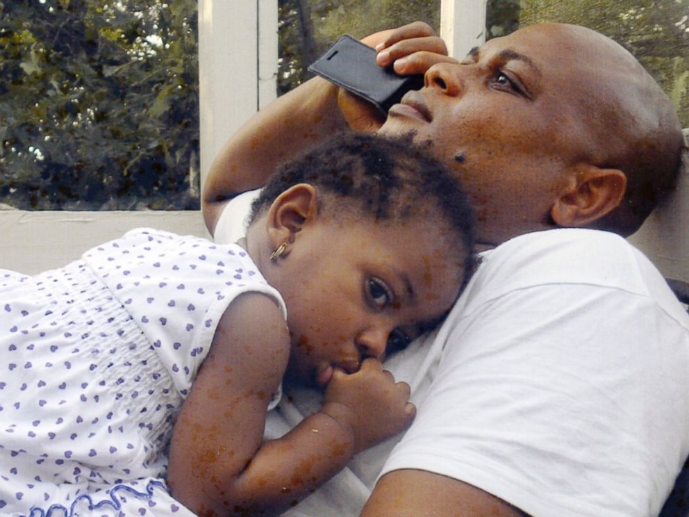PHOTO: Patrick Sawyer is shown with his daughter Ava at their home in Coon Rapids in an undated family photo.