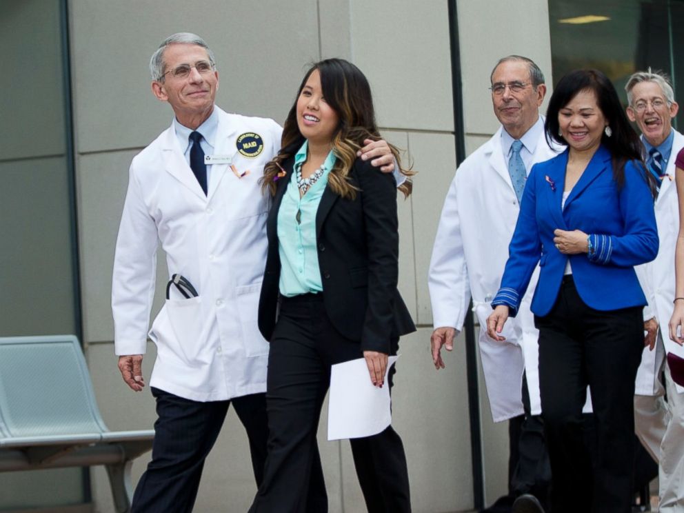 PHOTO: Patient Nina Pham is escorted outside of National Institutes of Health in Bethesda, Md., Oct. 24, 2014.