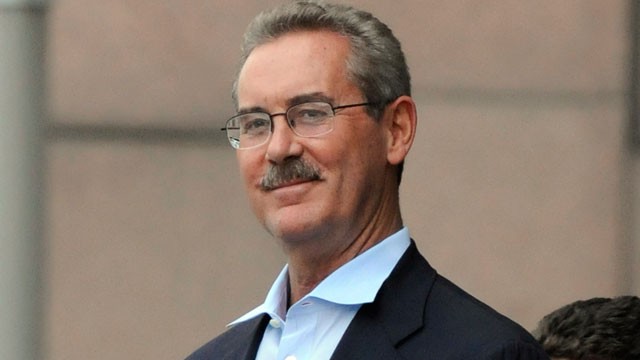 PHOTO: Billionaire R. Allen Stanford smiles as he is escorted out of the federal courthouse in Houston in this June 29, 2009 file photo.