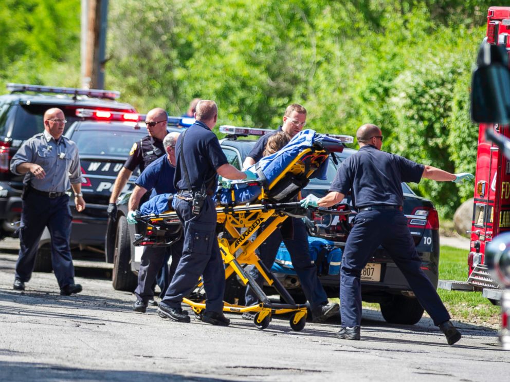PHOTO: Rescue workers take a 12-year-old stabbing victim to an ambulance in Waukesha, Wis. after she was attacked by two 12-year-old-friends who claim they were inspired by a story they read online.