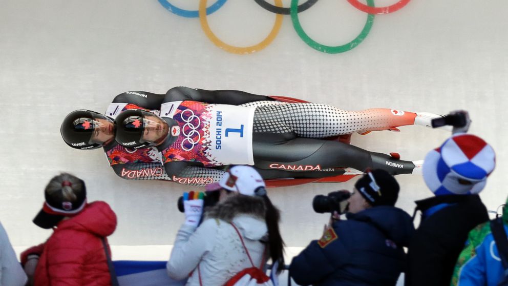 PHOTO: The doubles team of Tristan Walker and Justin Snith from Canada speed down the track on their first run during the mens doubles luge at the 2014 Winter Olympics on Feb. 12, 2014, in Krasnaya Polyana, Russia.