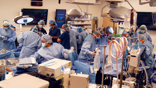 PHOTO: A surgical team at Johns Hopkins Hospital in Baltimore works on a double arm transplant for U.S. Army infantryman Brendan Marroco, 26, who lost all four limbs in Iraq, Dec. 18, 2012.