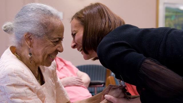 PHOTO: Music therapist Heather Davidson (R) embraces June Thorne after holding a drum circle with patients with Alzheimer's disease at the Copper Ridge Care Center in Sykesville, Maryland, on October 23, 2009.