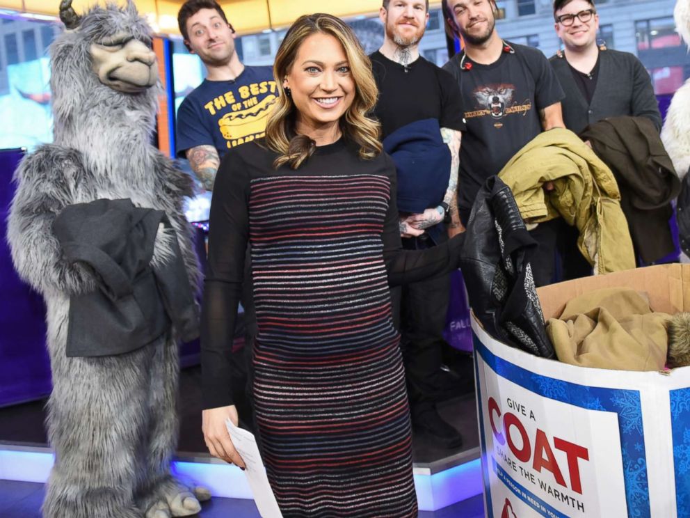 PHOTO: Fall Out Boy performs live on Good Morning America, Jan. 19, 2018 posing with Ginger Zee.
