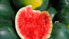 PHOTO: A sliced open watermelon is seen as locally grown fruits and vegetables are sold at the Herndon, Virginia, Farmer's Market July 30, 2009.