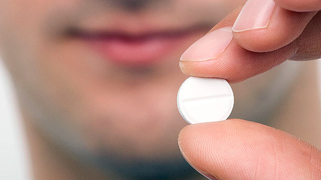 PHOTO: Taking daily aspirin may not be as harmless as doctors once thought.